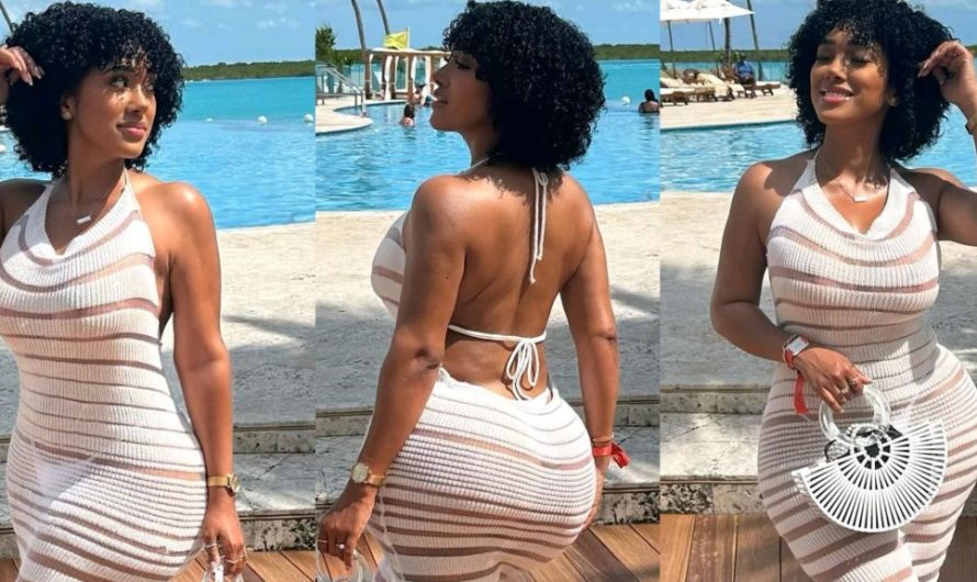 “Sunny days from sea side”- A Curvy African Beauty Mesmerizes Fans in White Lace Sundress.(Video)